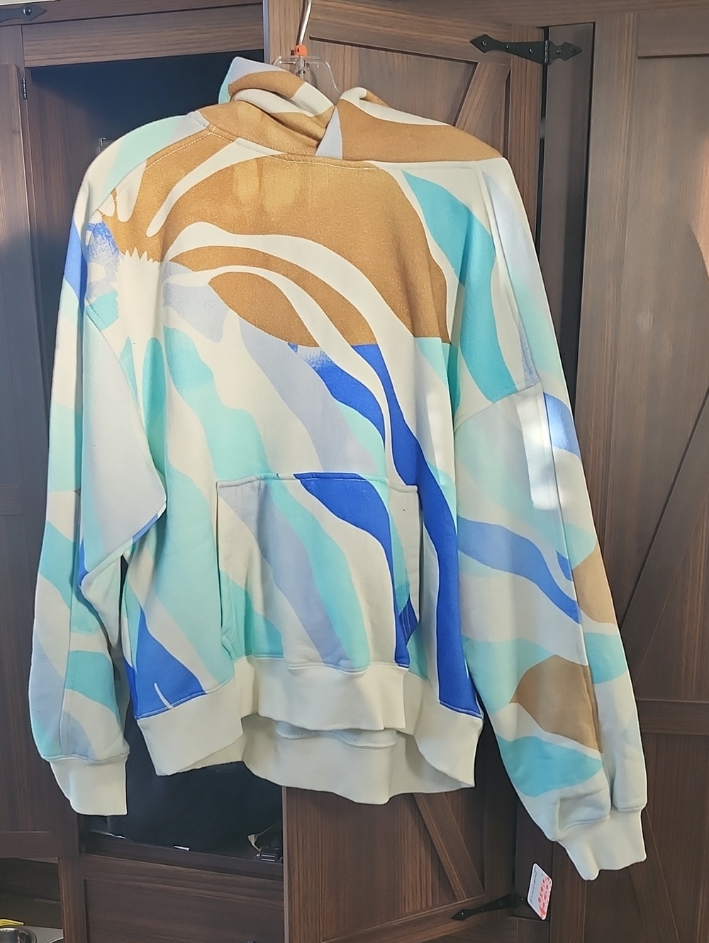 Free People Hooded Hody in Blue and Tan Wave Print